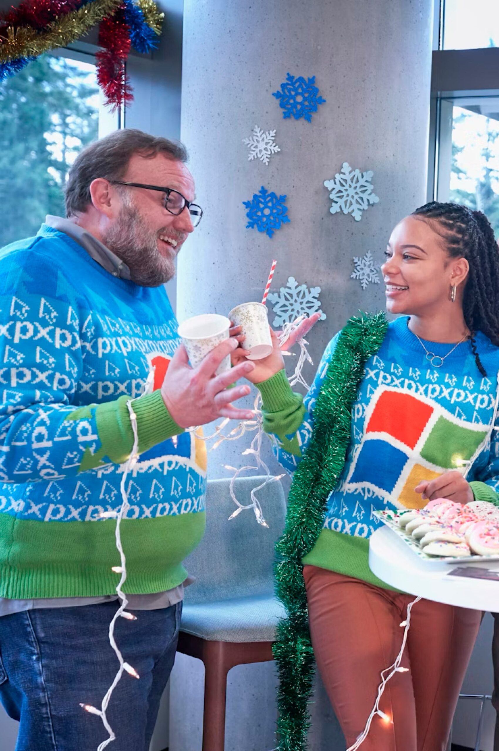 People in Christmas sweaters