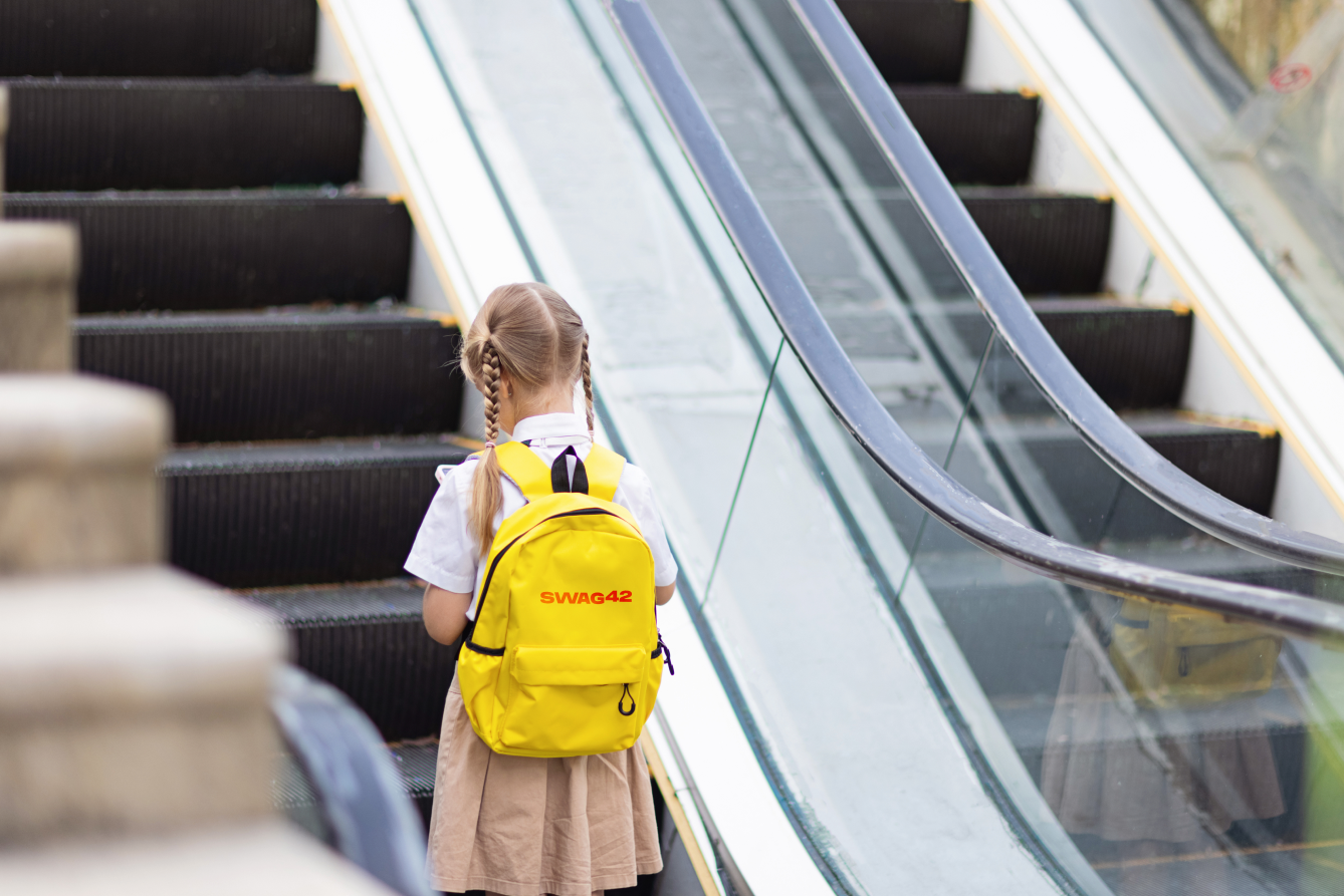 Brand ambassador with a branded backpack