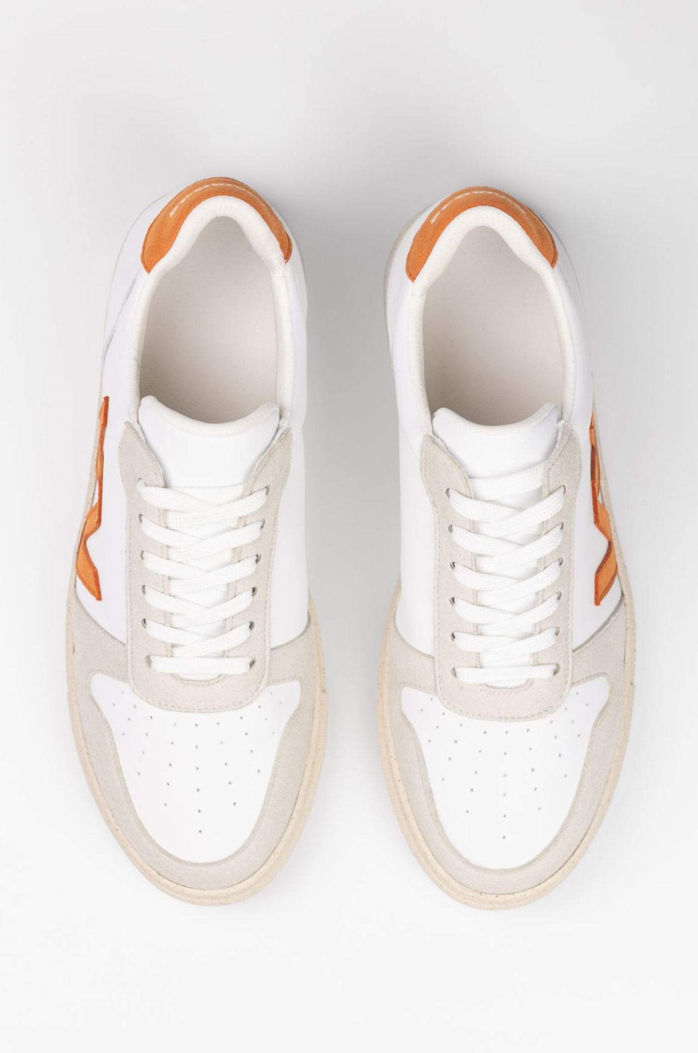 Custom eco-leather sneakers for sustainable swag